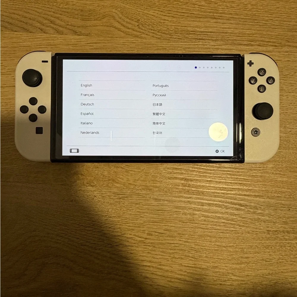 Nintendo Switch OLED (White) bundle. comes with all original parts and cords.